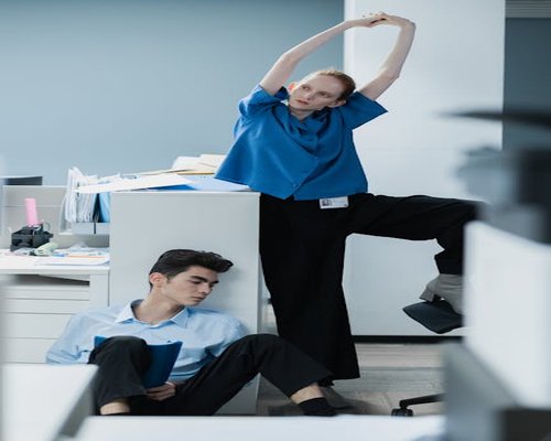 Office worker stretching gently