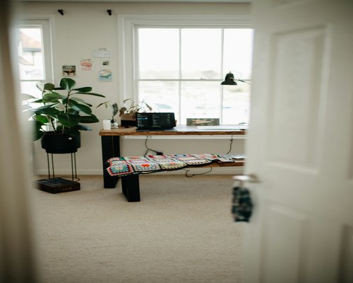 Person walking in home office space